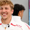 SUZUKA, JAPAN - MARCH 26: Liam Lawson of New Zealand and Visa Cash App Racing Bulls looks on during