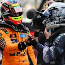 SUZUKA, JAPAN - MARCH 28: Third placed qualifier Oscar Piastri of Australia and McLaren congratulates Pole position qualifier Andrea Kimi Antonelli of Italy and Mercedes AMG Petronas F1 Team in parc ferme during qualifying ahead of the F1 Grand Prix of Japan at Suzuka Circuit on March 28, 2026 in Suzuka, Japan. (Photo by Rudy Carezzevoli/Getty Images)