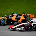 MONTREAL, QUEBEC - MAY 24: Lando Norris of Great Britain driving the (1) McLaren MCL40 Mercedes and Oliver Bearman of Great Britain driving the (87) Haas F1 VF-26 Ferrari battle for track position during the F1 Grand Prix of Canada at Circuit Gilles-Villeneuve on May 24, 2026 in Montreal, Quebec. (Photo by James Sutton - Formula 1/Formula 1 via Getty Images)