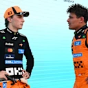 MIAMI, FLORIDA - MAY 03: Second placed Lando Norris of Great Britain and McLaren and Third placed Oscar Piastri of Australia and McLaren talk in parc ferme during the F1 Grand Prix of Miami at Miami International Autodrome on May 03, 2026 in Miami, Florida. (Photo by Mark Sutton - Formula 1/Formula 1 via Getty Images)
