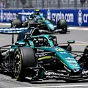 MIAMI, FLORIDA - MAY 01: Lance Stroll of Canada driving the (18) Aston Martin F1 Team AMR26 Honda and Fernando Alonso of Spain driving the (14) Aston Martin F1 Team AMR26 Honda on track during practice ahead of the F1 Grand Prix of Miami at Miami International Autodrome on May 01, 2026 in Miami, Florida. (Photo by Mark Sutton - Formula 1/Formula 1 via Getty Images)