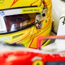 BAHRAIN, BAHRAIN - FEBRUARY 13: Lewis Hamilton of Great Britain and Scuderia Ferrari prepares to