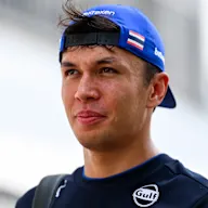 SINGAPORE, SINGAPORE - OCTOBER 05: Alexander Albon of Thailand and Williams arrives in the Paddock