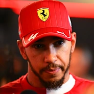 ABU DHABI, UNITED ARAB EMIRATES - DECEMBER 06: Sixteenth placed qualifier Lewis Hamilton of Great
