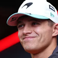 SAO PAULO, BRAZIL - NOVEMBER 06: Lando Norris of Great Britain and McLaren looks on in the Paddock