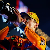 LAS VEGAS, NEVADA - NOVEMBER 22: Second placed Lando Norris of Great Britain and McLaren drinks