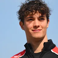 SHANGHAI, CHINA - MARCH 13: Oliver Bearman of Great Britain and Haas F1 arrives in the Paddock