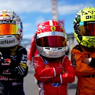 SUZUKA, JAPAN - MARCH 26: Young fans dressed as Lando Norris of Great Britain and McLaren, Charles