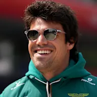 SHANGHAI, CHINA - MARCH 12: Lance Stroll of Canada and Aston Martin F1 Team walks in the Paddock