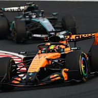 SUZUKA, JAPAN - MARCH 29: Oscar Piastri of Australia driving the (81) McLaren MCL40 Mercedes leads