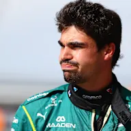 NORTHAMPTON, ENGLAND - JULY 03: Lance Stroll of Canada and Aston Martin F1 Team looks on during