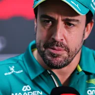MIAMI, FLORIDA - APRIL 30: Fernando Alonso of Spain and Aston Martin F1 Team talks to the media