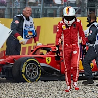 HOCKENHEIM, GERMANY - JULY 22: Sebastian Vettel of Germany and Ferrari walks from his car after