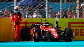 MIAMI, FLORIDA - MAY 06: Charles Leclerc of Monaco and Ferrari walks from his car after crashing