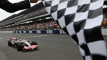 Indianapolis, UNITED STATES: McLaren-Mercedes Formula One driver Lewis Hamilton of Britain crosses