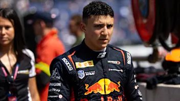 MONTE-CARLO, MONACO - MAY 26: Isack Hadjar walks in pitlane prior to the F1 Grand Prix of Monaco at