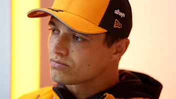 SPA, BELGIUM - JULY 24: Lando Norris of Great Britain and McLaren arrives in the Paddock during