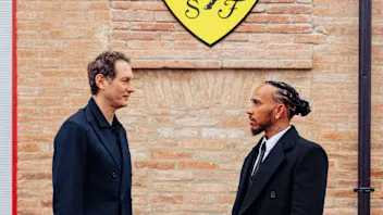 LAS VEGAS, NEVADA - NOVEMBER 19: Lewis Hamilton of Great Britain and Scuderia Ferrari talks to the