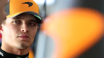 SHANGHAI, CHINA - MARCH 21: Lando Norris of Great Britain and McLaren looks on in the garage during