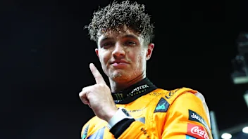 SINGAPORE, SINGAPORE - SEPTEMBER 21: Pole position qualifier Lando Norris of Great Britain and
