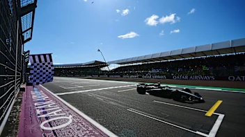 NORTHAMPTON, ENGLAND - JULY 07: Race winner Lewis Hamilton of Great Britain driving the (44)