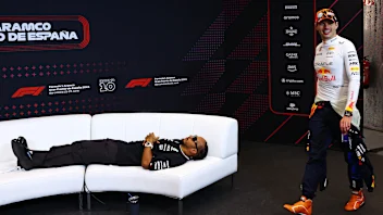 BARCELONA, SPAIN - JUNE 23: Third placed Lewis Hamilton of Great Britain and Mercedes lies on the