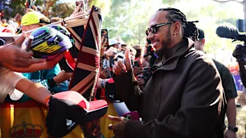 MELBOURNE, AUSTRALIA - MARCH 14: Lewis Hamilton of Great Britain and Scuderia Ferrari signs