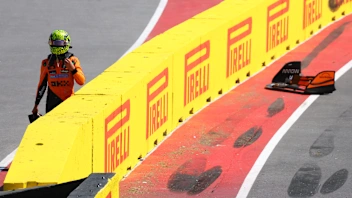 MONTREAL, QUEBEC - JUNE 15: Marshals recover the damaged car of Lando Norris of Great Britain and