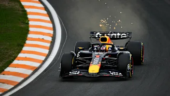 ZANDVOORT, NETHERLANDS - AUGUST 29: Sparks fly behind Max Verstappen of the Netherlands driving the