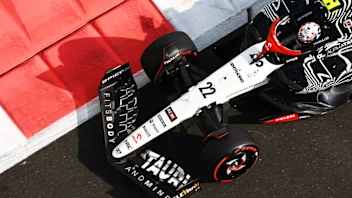 ABU DHABI, UNITED ARAB EMIRATES - NOVEMBER 25: Yuki Tsunoda of Japan driving the (22) Scuderia