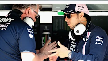 SPA, BELGIUM - JULY 29: Otmar Szafnauer, team principal of Alpine F1 hugs Sergio Perez of Mexico