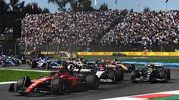 MEXICO CITY, MEXICO - OCTOBER 29: Carlos Sainz of Spain driving (55) the Ferrari SF-23 leads Daniel