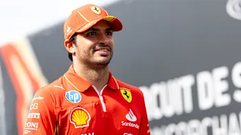 SPA, BELGIUM - JULY 25: Carlos Sainz of Spain and Ferrari smiling in the paddock during previews