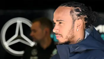 BAHRAIN, BAHRAIN - MARCH 01: Lewis Hamilton of Great Britain and Mercedes walks in the Paddock