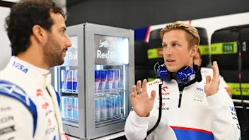 ZANDVOORT, NETHERLANDS - AUGUST 23: Liam Lawson of New Zealand and Visa Cash App RB talks with