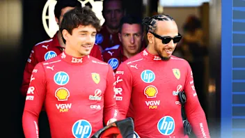 MELBOURNE, AUSTRALIA - MARCH 13: Lando Norris of Great Britain and McLaren and Oscar Piastri of