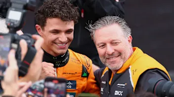 MELBOURNE, AUSTRALIA - MARCH 16: Race winner Lando Norris of Great Britain and McLaren and Zak