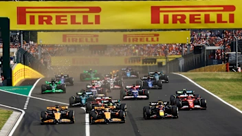 BUDAPEST, HUNGARY - JULY 21: Lando Norris, McLaren MCL38, leads Max Verstappen, Red Bull Racing