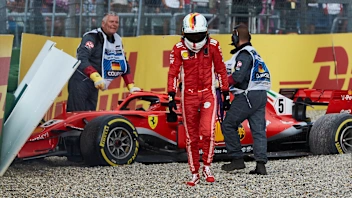 HOCKENHEIM, GERMANY - JULY 22: Sebastian Vettel of Germany and Ferrari walks from his car after