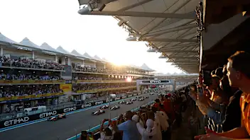 ABU DHABI, UNITED ARAB EMIRATES - DECEMBER 08: Lando Norris, McLaren MCL38, leads Oscar Piastri,