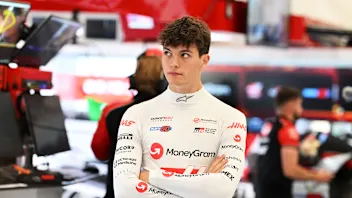 NORTHAMPTON, ENGLAND - JULY 05: Oliver Bearman of Great Britain and Haas F1 looks on in the garage