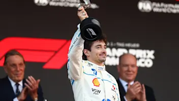MONTE-CARLO, MONACO - MAY 25: Second placed Charles Leclerc of Monaco and Scuderia Ferrari lifts
