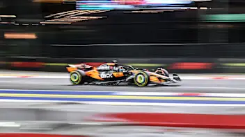 SINGAPORE, SINGAPORE - OCTOBER 03: Oscar Piastri of Australia driving the (81) McLaren MCL39