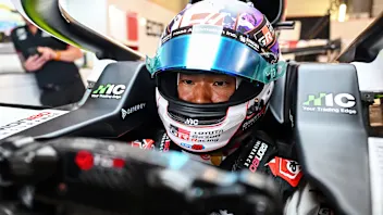 SPIELBERG, AUSTRIA - JUNE 25: Ryo Hirakawa of Japan and Haas F1 has a seat fit in the garage during