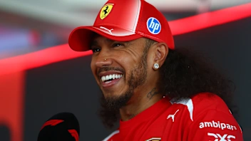 BARCELONA, SPAIN - JUNE 11: Lewis Hamilton of Great Britain and Scuderia Ferrari talks to the media