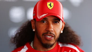 BARCELONA, SPAIN - JUNE 11: Lewis Hamilton of Great Britain and Scuderia Ferrari talks to the media