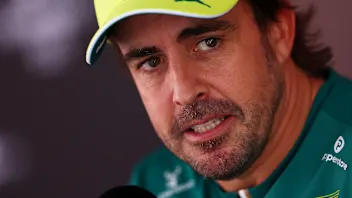 SPA, BELGIUM - JULY 16: Fernando Alonso of Spain and Aston Martin F1 Team talks to the media during