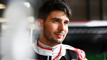 SPA, BELGIUM - JULY 16: Esteban Ocon of France and Haas F1 looks on in the garage during previews