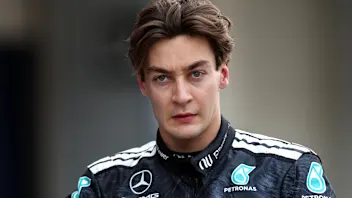 SUZUKA, JAPAN - MARCH 28: Second placed qualifier George Russell of Great Britain and Mercedes AMG