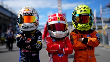 SUZUKA, JAPAN - MARCH 26: Young fans dressed as Lando Norris of Great Britain and McLaren, Charles